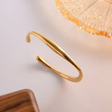 Women's Twisted 18K Gold-Plated Stainless Steel Bangle