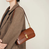 Women's Compact Crossbody Bag with Gold Flap Detail