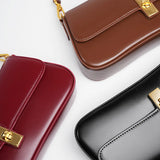 Women's Compact Crossbody Bag with Gold Flap Detail