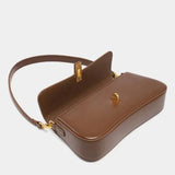 Women's Compact Crossbody Bag with Gold Flap Detail